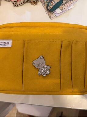Delfonics yellow pouch